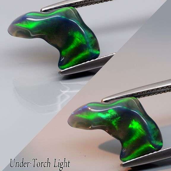 Dazzling 2.81ct free form black Opal vein