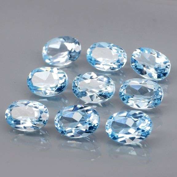 Superb quality 9.04ct 9 piece sky blue Topaz set