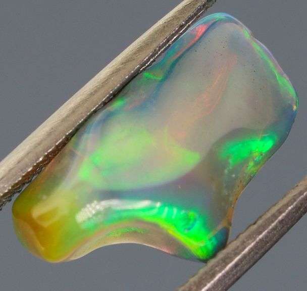 High fire collectors 2ct free form black Opal vein