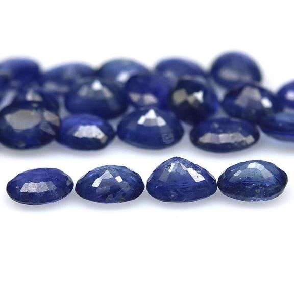 Excellent 9.60ct Royal blue Sapphire set