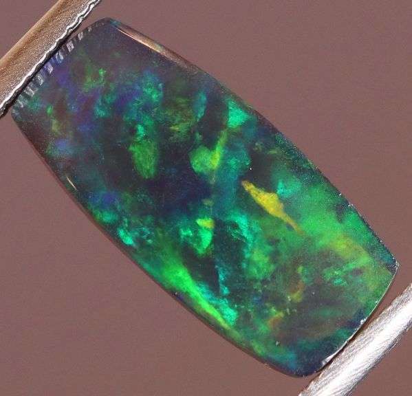 Outstanding 1.79ct full body flashing Black Opal