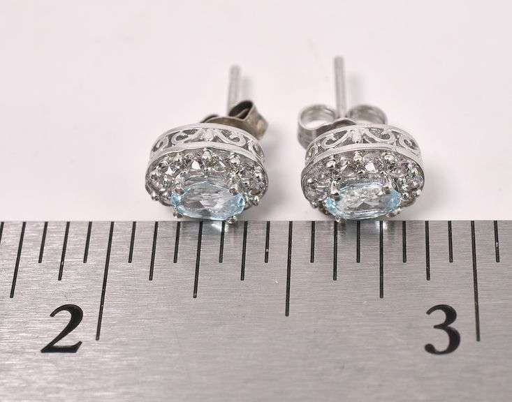 Blue Topaz and CZ Set In Sterling Silver