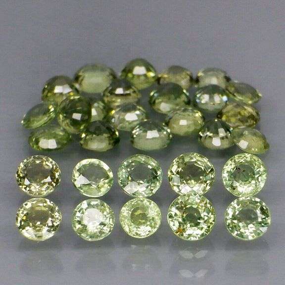 Fantastic 6.23ct diamond cut GREEN Sapphire set