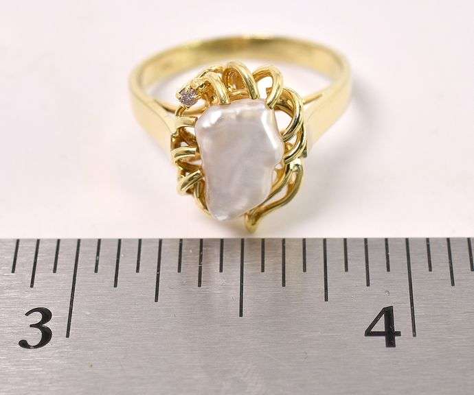 Elegant Freshwater Pearl And Diamond Ring In Yellow Gold