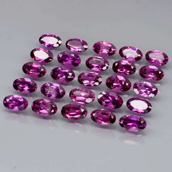 Ravishing 7.31ct violet pink Rhodolite Garnet set