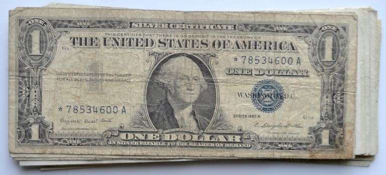 23 $1 1957 A Silver Certificates Including 3 Stars.