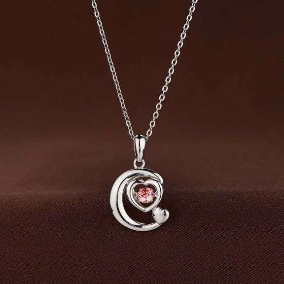 "Take you to the moon" solid sterling silver with center stone moving pendant