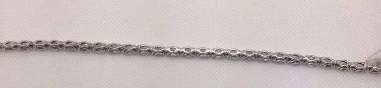 GORGEOUS 18K WHITE GOLD OVAL CUT DIAMOND TENNIS BRACELET