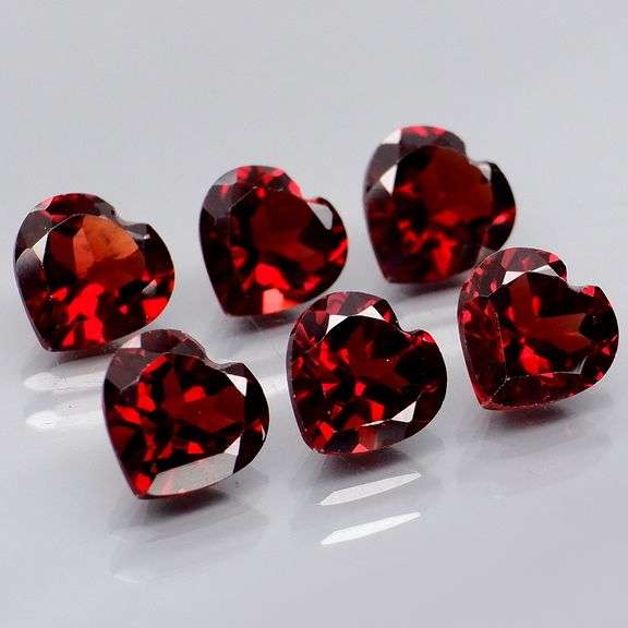 Top tier 5.63ct heart cut cherry red Garnet set