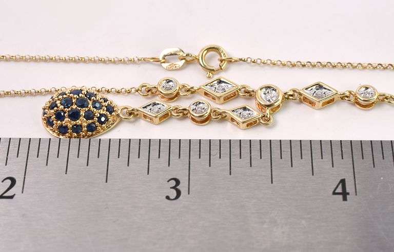 Luminescent Blue Sapphire and Diamond Necklace In 14K Yellow Gold