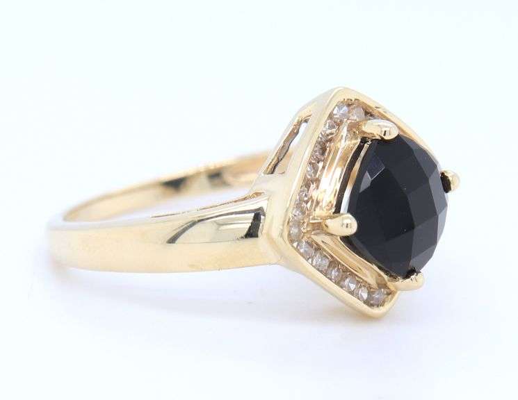 Charming Yellow Gold Black Onyx and Diamond Halo Cocktail Ring