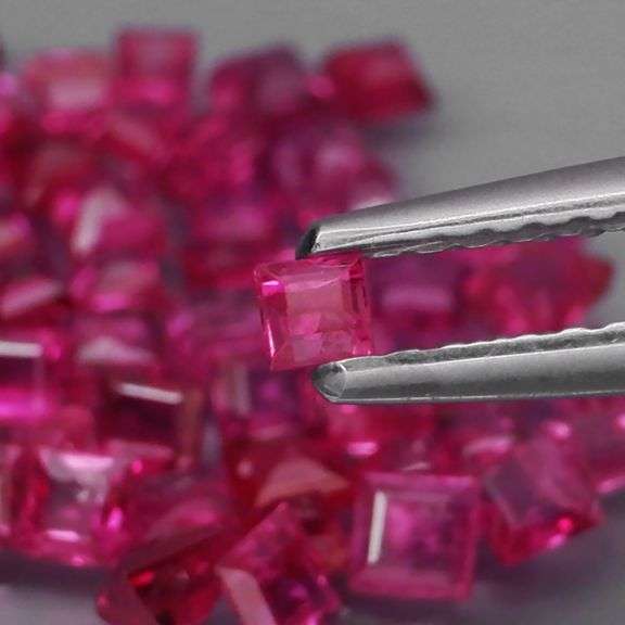 Outstanding 3.63ct 55 piece princess cut Ruby set