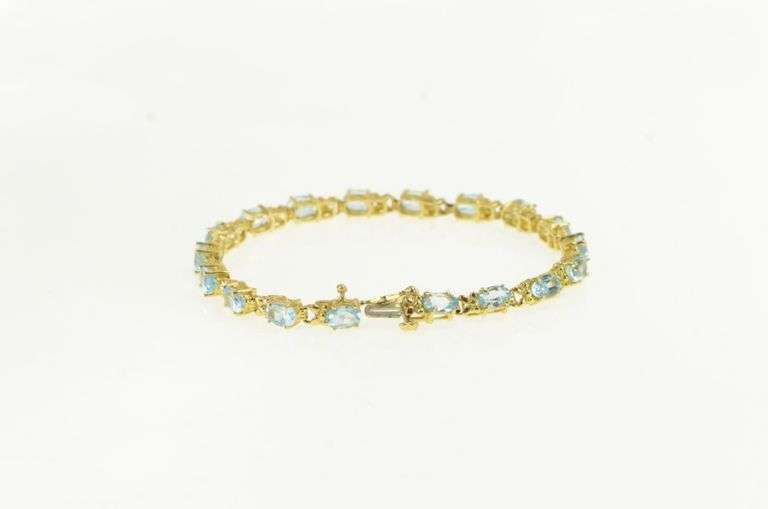 14K Yellow Gold Oval Blue Topaz Flower Blossom Tennis Bracelet