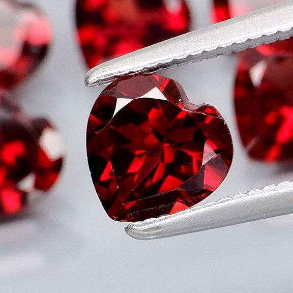 Top tier 5.63ct heart cut cherry red Garnet set