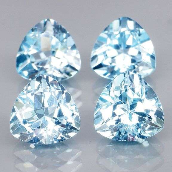 Matched! 4 piece 8.59ct full fire sky blue Topaz set