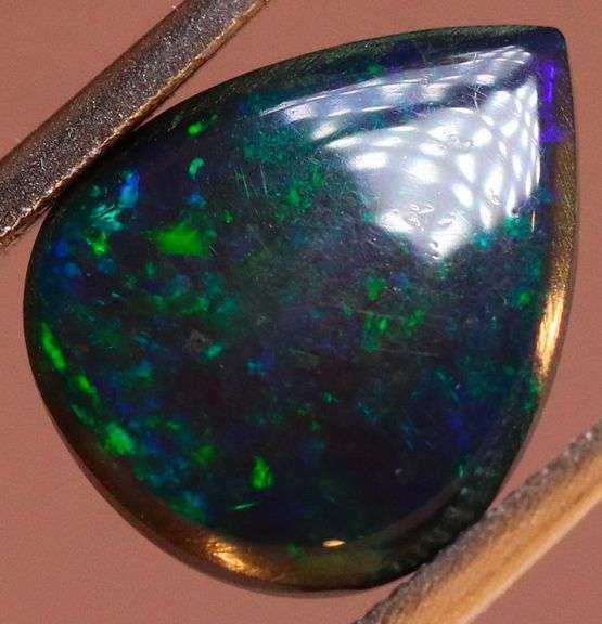 Magnificent 2.15ct blue and green flashing Black Opal
