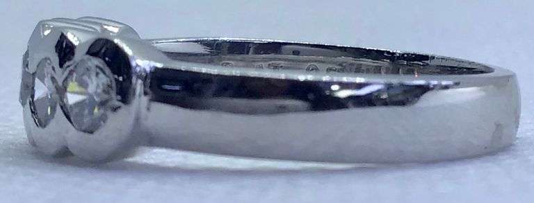 FANCY PLATINUM SEMI BEZEL SET DIAMOND RING