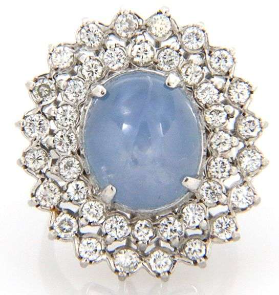 6.00ct Oval Star Sapphire Cabochon and 2.00ctw Diamond Starburst Frame Ring in 14K
