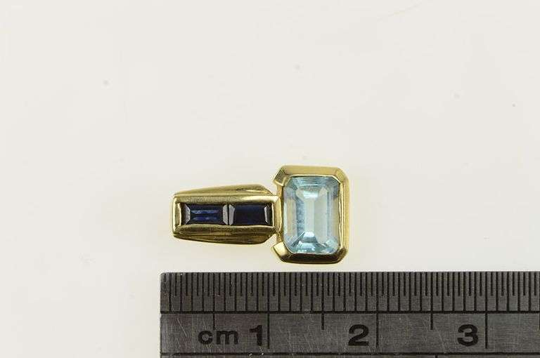 14K Yellow Gold Emerald Cut Blue Topaz Sapphire Accent Pendant