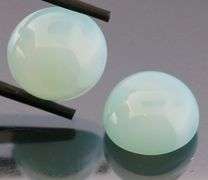 Glowing 17.00ct blue Chalcedony cabochon pair