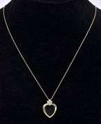 Endearing Black Onyx And Diamond Heart Pendant Necklace In 14K Yellow Gold