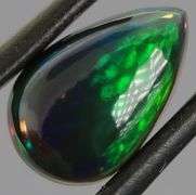 Magnificent 2.40ct teal and green flashing Black Opal
