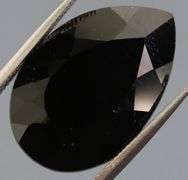 Elegant 10.22ct silky black Laos Tektite