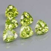 Fantastic 5.20ct 6x6mm trillion cut Peridot set