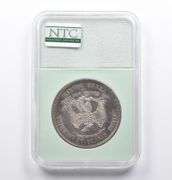 AU55 1873-CC Seated Liberty Trade Dollar NTC