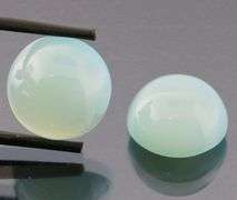 Glowing 17.00ct blue Chalcedony cabochon pair