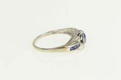 10K White Gold Trillion Syn. Sapphire Diamond Wavy Bypass Ring