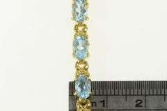 14K Yellow Gold Oval Blue Topaz Flower Blossom Tennis Bracelet
