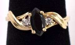 Extraordinary Black Gem and Diamond Ring In Yellow Gold