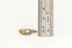 10K Yellow Gold Oval Blue Topaz Diamond Accent Bypass Ring