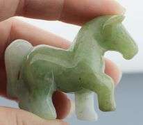 Adorable 197.41ct Jade horse carving