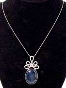 Enchanting Natural Blue Star Sapphire and Diamond Pendant Necklace in White Gold