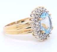 Gorgeous Yellow Gold Oval Aqumarine and Diamond Ring
