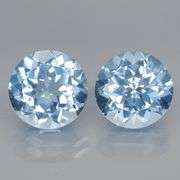 Eye clean 9.08ct round brilliant cut Topaz pair