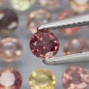 Fantastic 4.93ct round cut Sapphire set