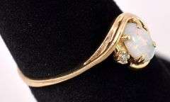 Dazzling Opal and Diamond Ring In Yellow Gold