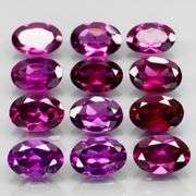 Rich 6.80ct oval cut violet pink Rodolite Garnet set