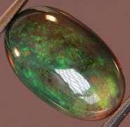 Exciting! 2.15ct floral fairy fire flashing Black Opal