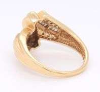 Beautiful Round Brilliant Cut and Baguette Diamond Ring in Yellow Gold
