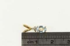 14K Yellow Gold Oval Blue Topaz Diamond Cluster Accent Pendant