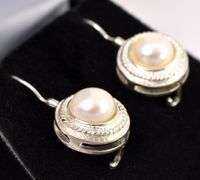 Pearl Dangle Earrings In Sterling Silver