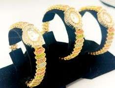 GROUP LOT OF 5x MATCHING 14KT YELLOW GOLD PLATED GENEVA WATCHES WITH GEMSTONES.