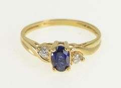 10K Yellow Gold Oval Syn. Sapphire Cubic Zirconia Accent Ring