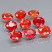Uniquely colored 4.74ct Imperial red Sapphire set