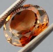 Premium 6.31ct calico colored Imperial Topaz solitaire