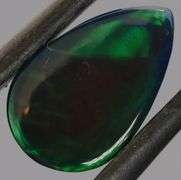 Magnificent 2.40ct teal and green flashing Black Opal